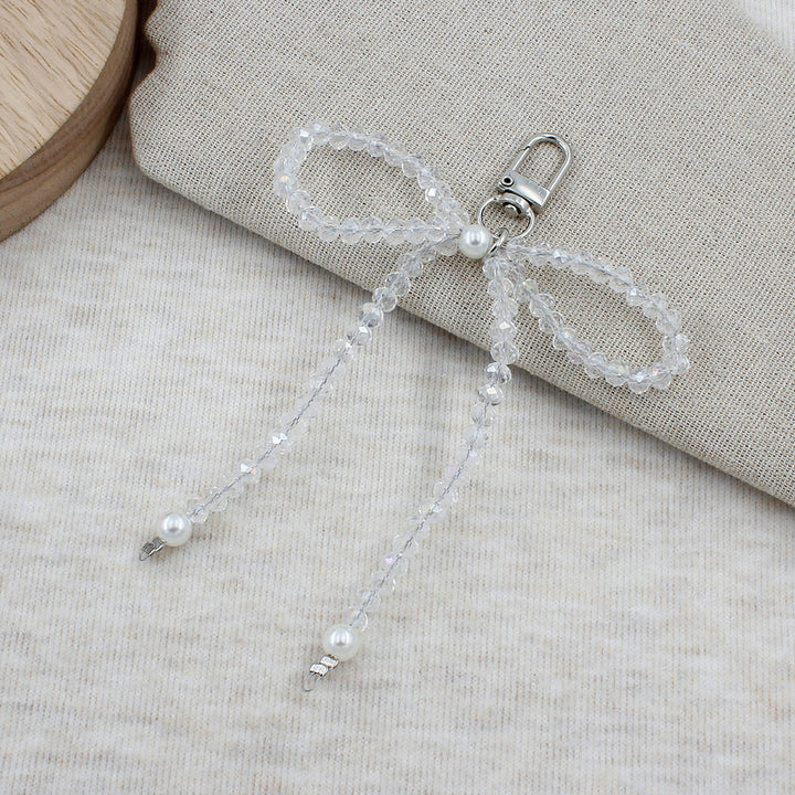 Elegant Beaded Bow Brooch Stornfield