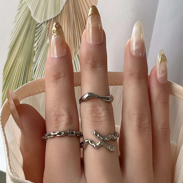 Artistic Press-On Nail Set with Gold and Floral Accents Stornfield