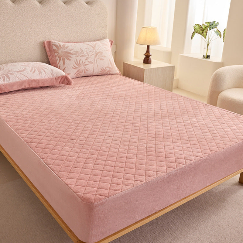 Quilted mattress protector with non-slip bottom and soft microfiber cover