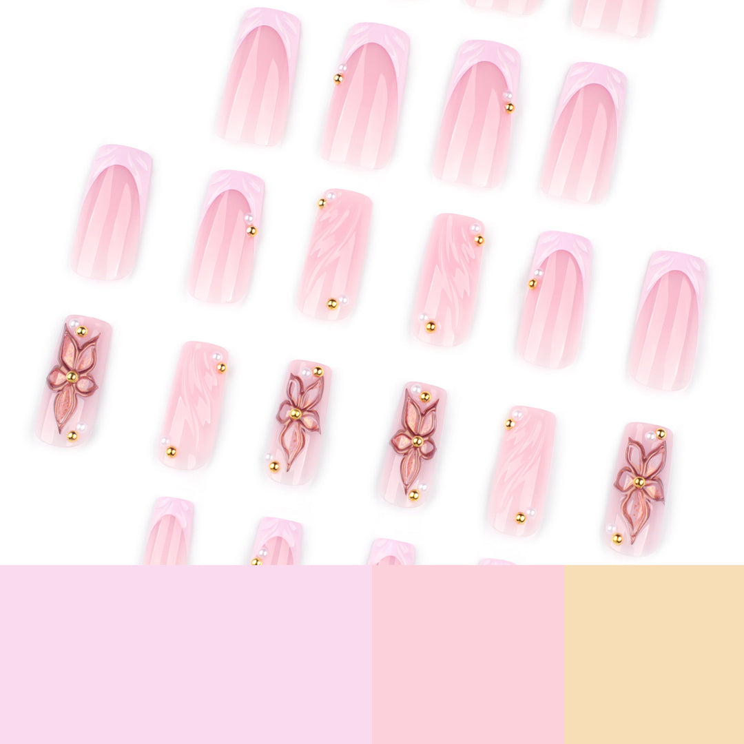 Artistic acrylic nails with flower design and glitter variations Stornfield