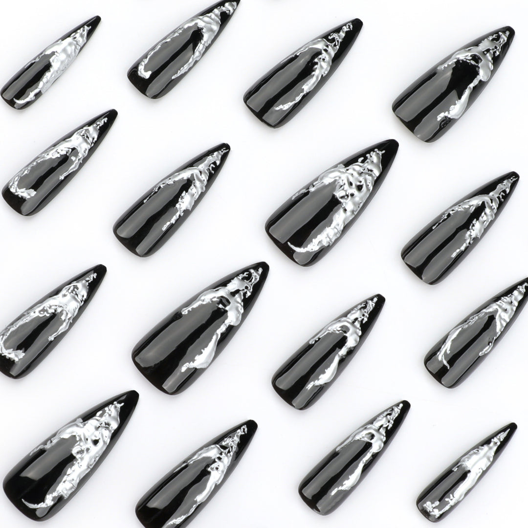 Artistic stiletto nails with modern metal effect Stornfield