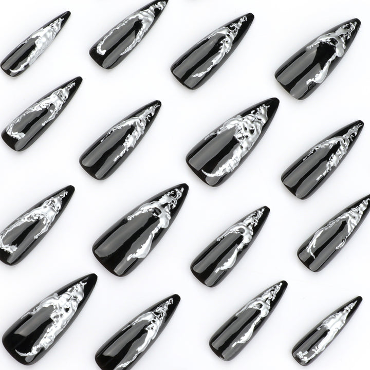 Artistic stiletto nails with modern metal effect Stornfield