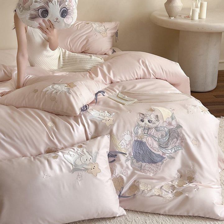 Exclusive satin bed linen set with detailed embroidery of cats and moon motif
