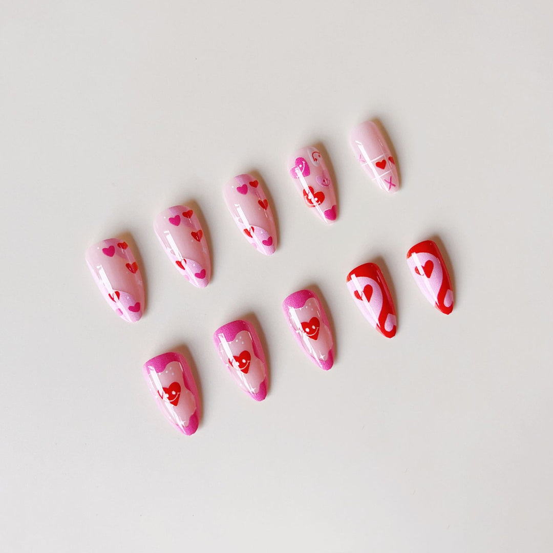 Acrylic nail set with romantic heart motifs and modern designs Stornfield