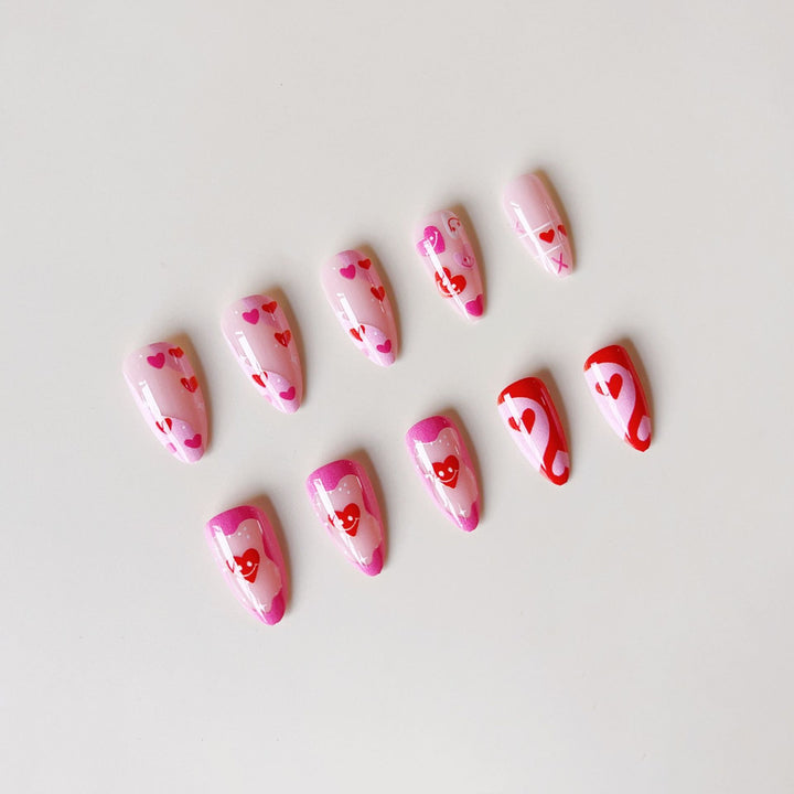 Acrylic nail set with romantic heart motifs and modern designs Stornfield