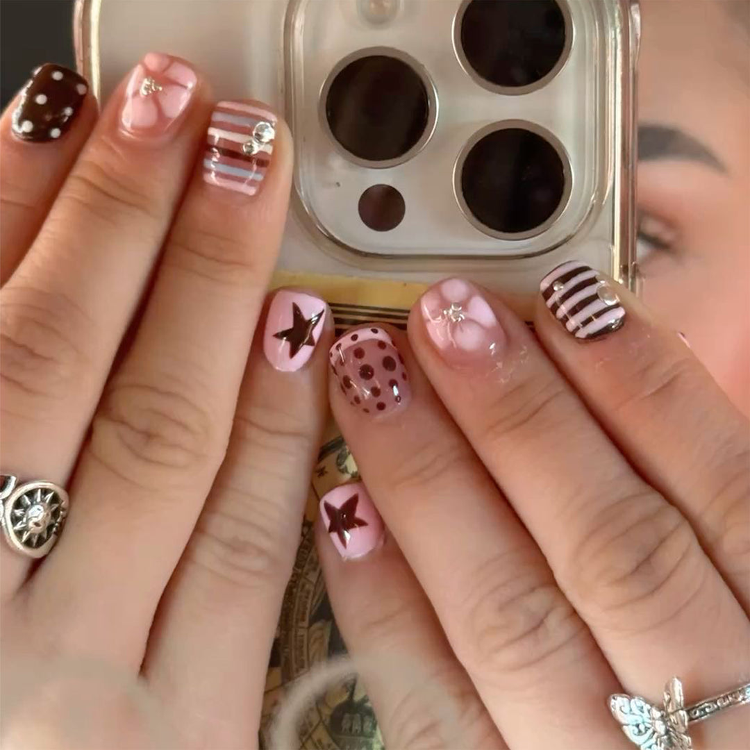 Creative Nail Art with Playful Designs Stornfield