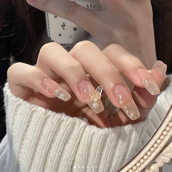 Artificial nails with elegant bows and pearl decorations Stornfield