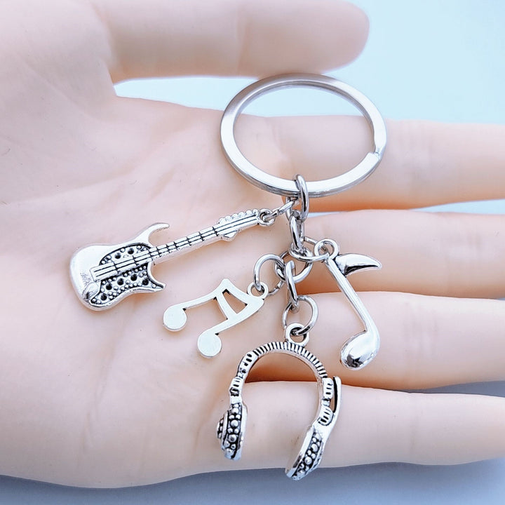 Keychain with musical instruments motifs Stornfield