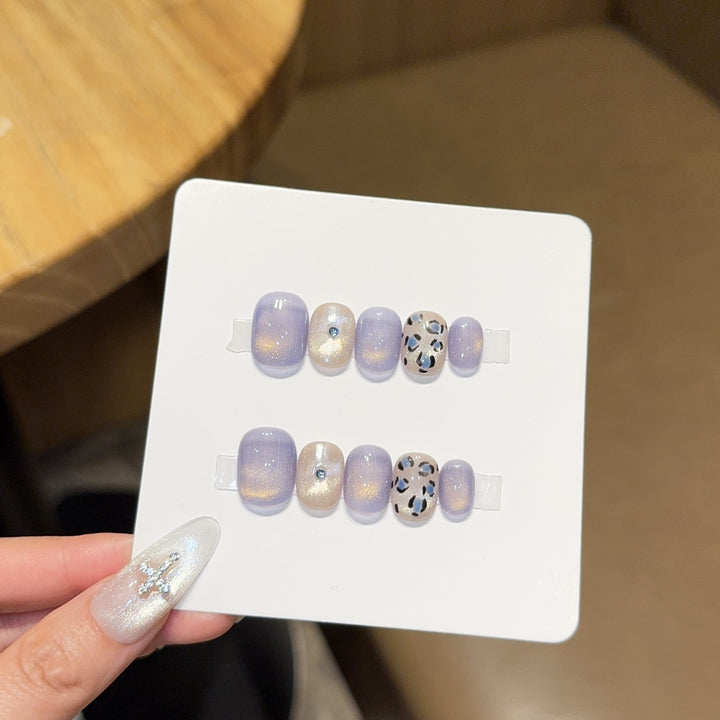 Glamorous artificial nails with elegant glitter elements Stornfield