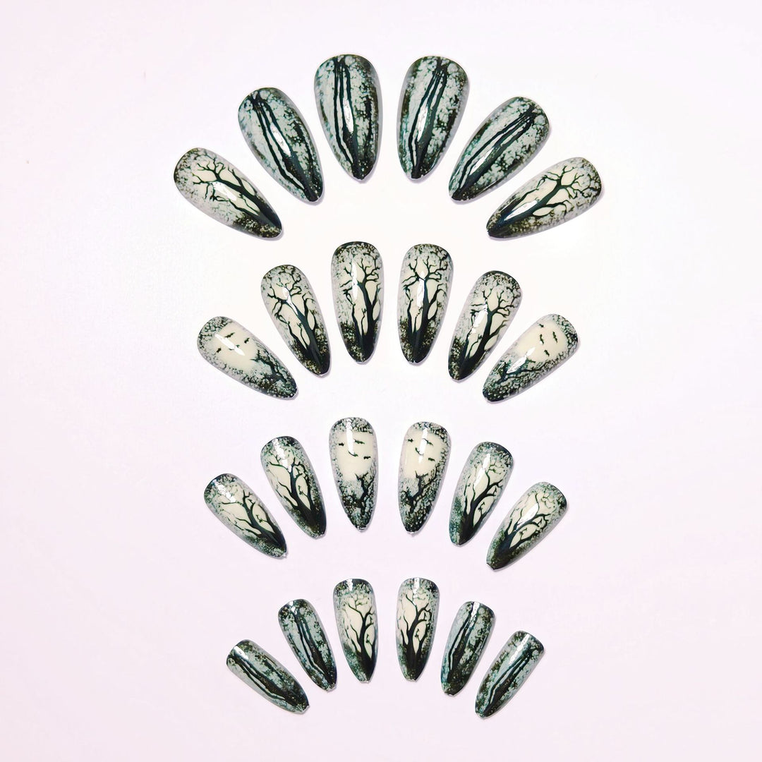 Art nails with impressive forest motif Stornfield
