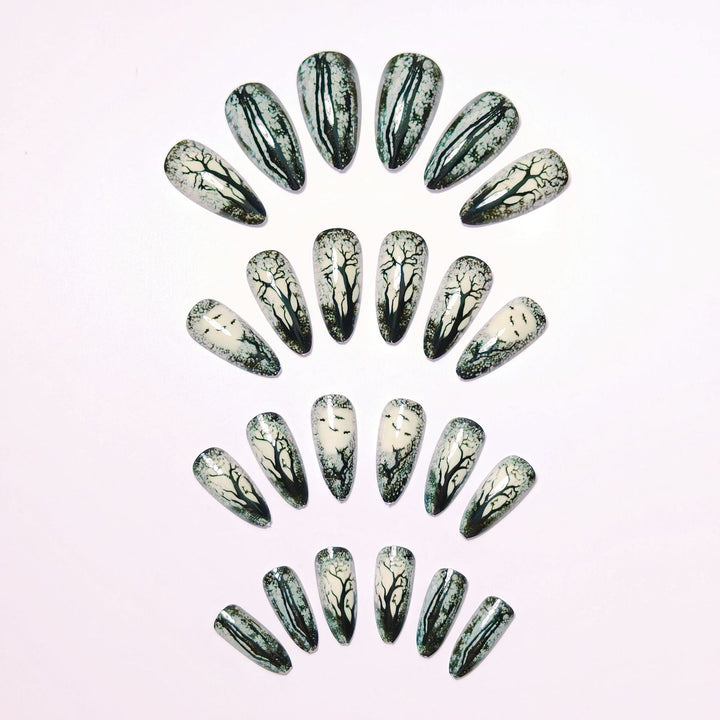 Art nails with impressive forest motif Stornfield
