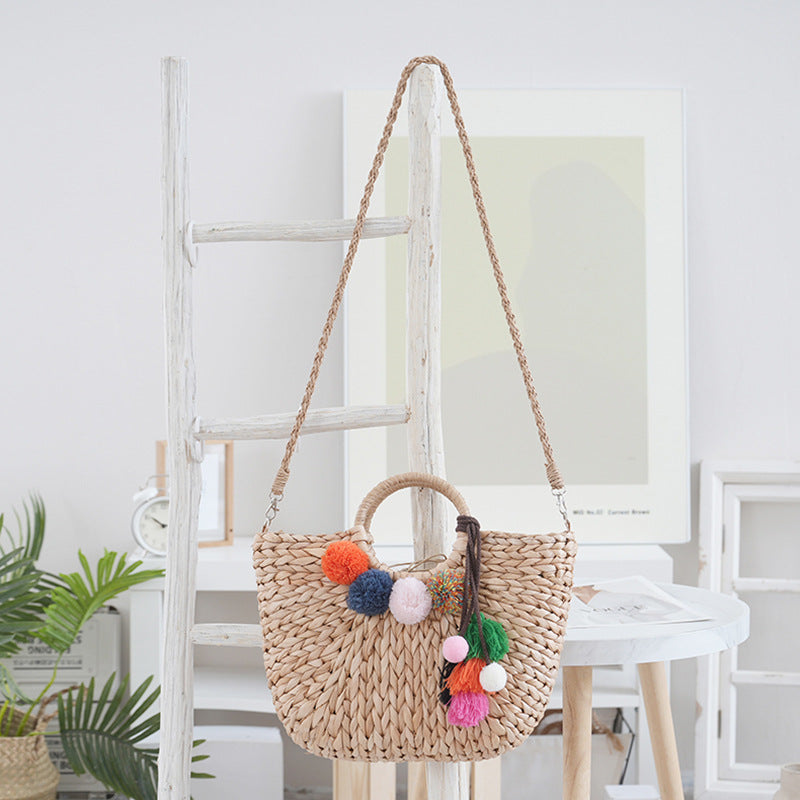 Basket bag with colorful pompons Stornfield