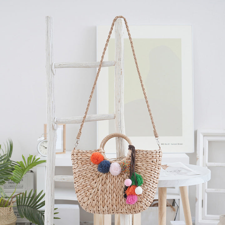 Basket bag with colorful pompons Stornfield