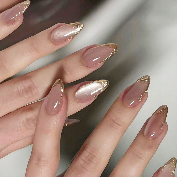 Artificial nails with trendy gold tips Stornfield