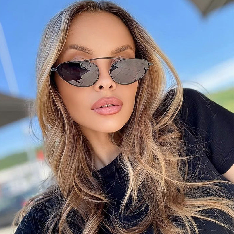 Ladies fashionable sunglasses in elegant oval design Stornfield