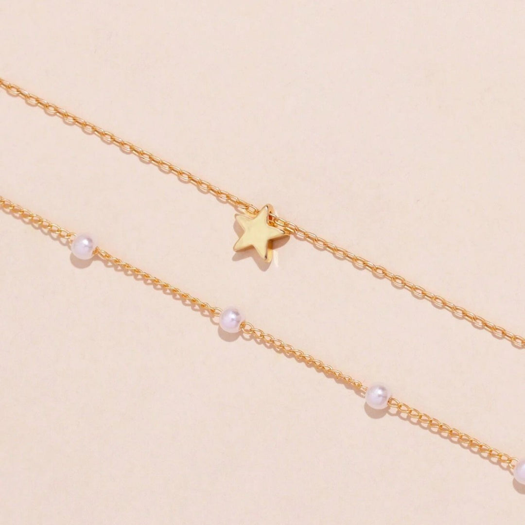 Layered Pearl and Star Charm Necklace Stornfield