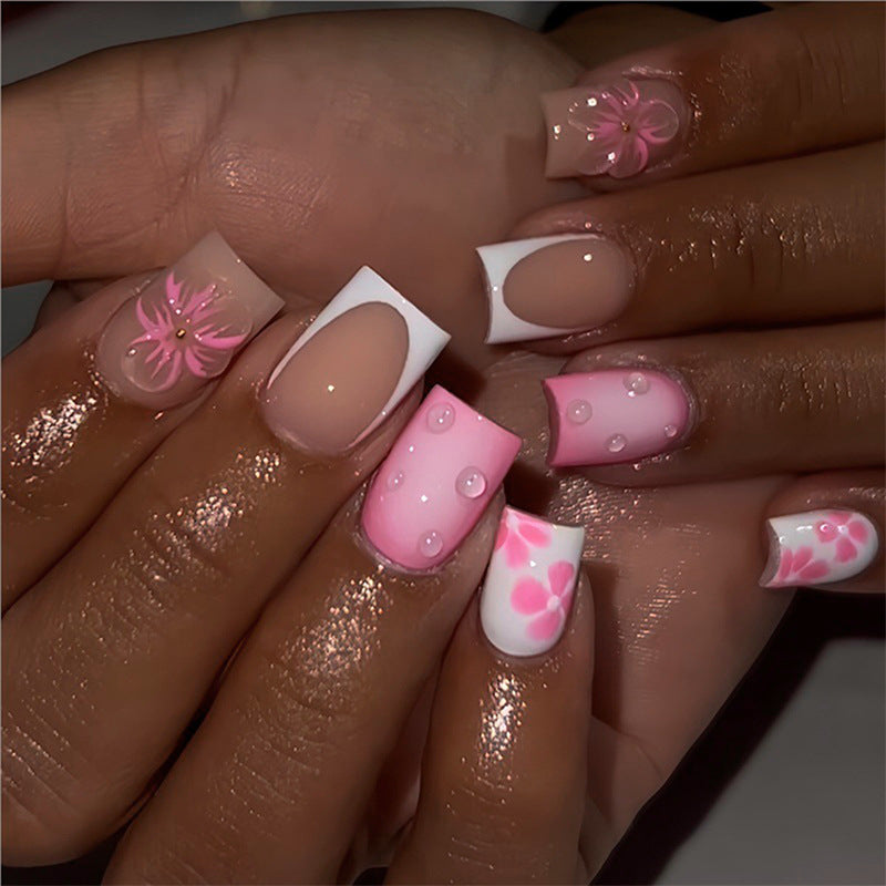 Acrylic nail set with floral and glamorous design Stornfield