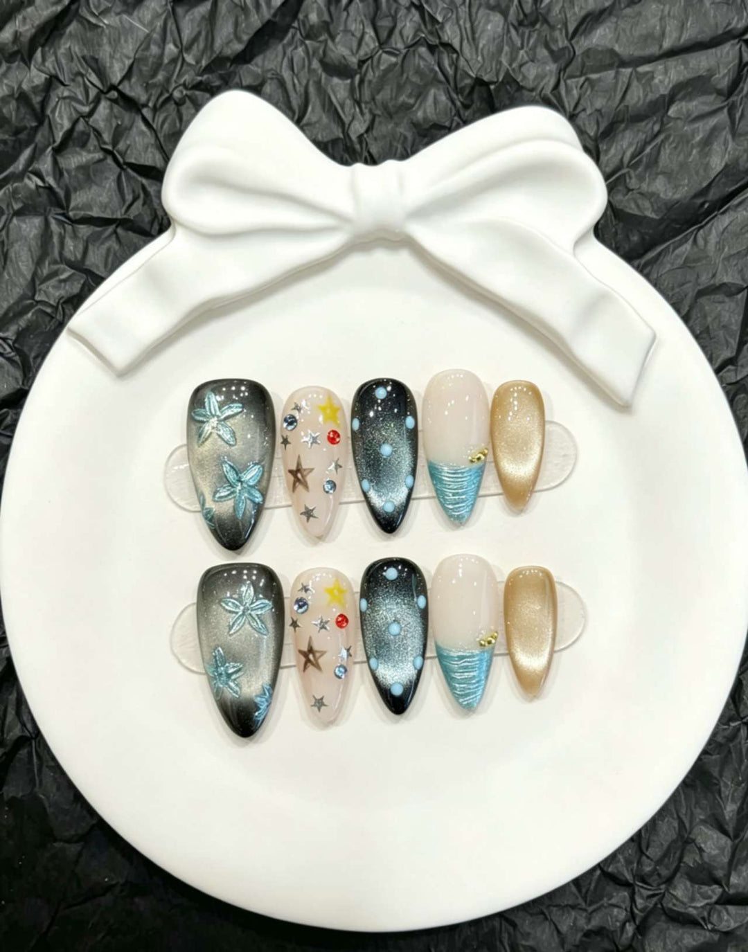 Decorative Press-On Nail Art Set with Floral and Whimsical Designs