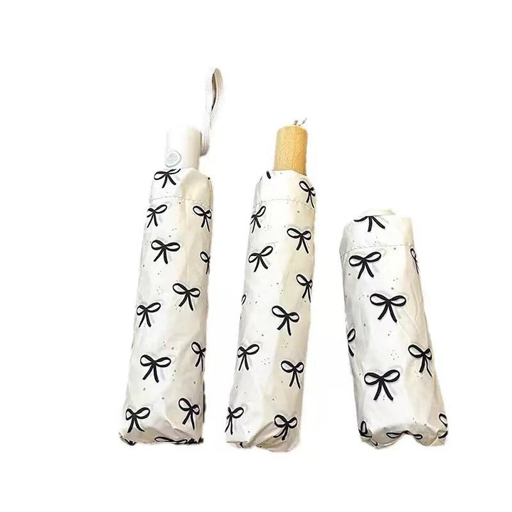 Women's foldable umbrella with elegant bow design Stornfield