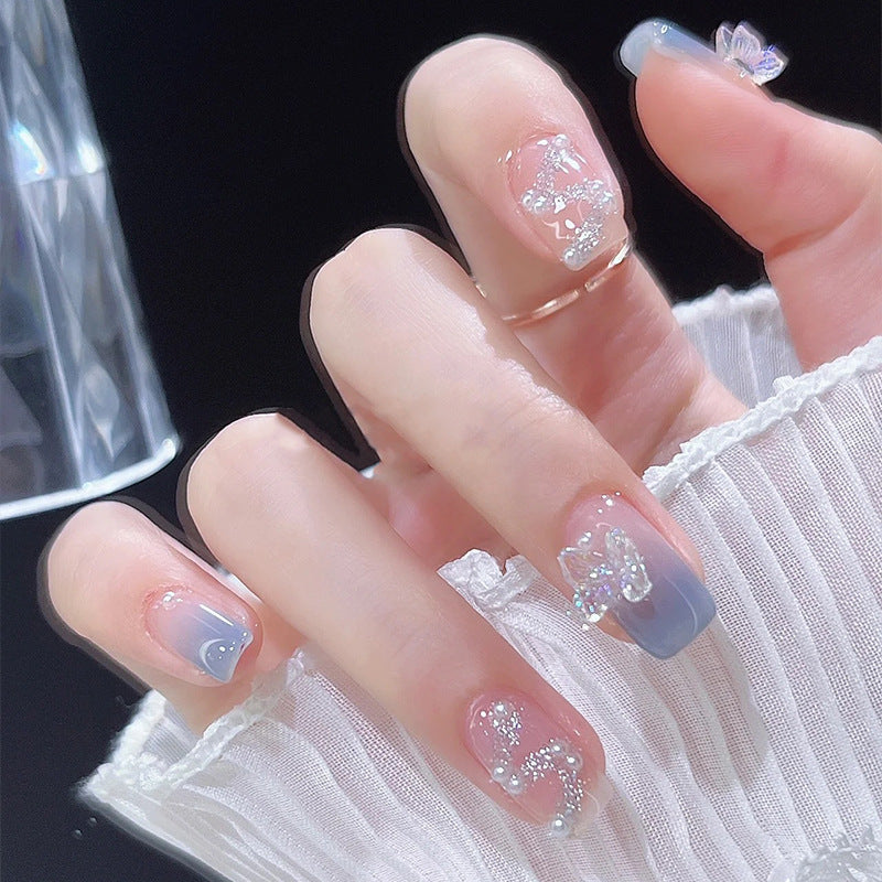 Acrylic nail set with sparkling glitter elements and appealing ombre design Stornfield