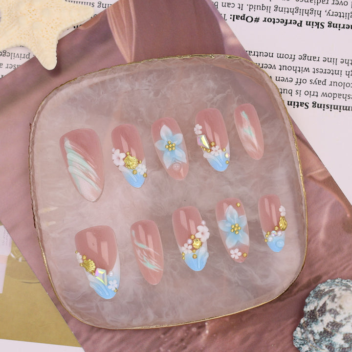 Artificial nail set with elaborate floral accents Stornfield