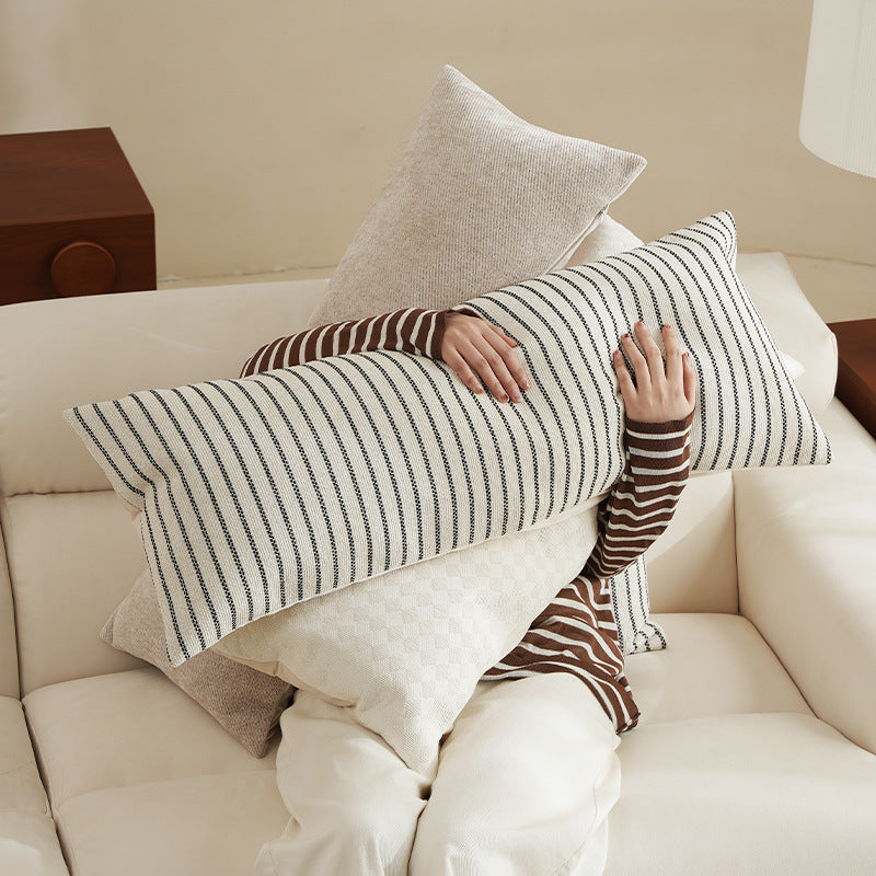 Long rectangular lumbar and neck pillow with textured woven look and concealed zipper Stornfield