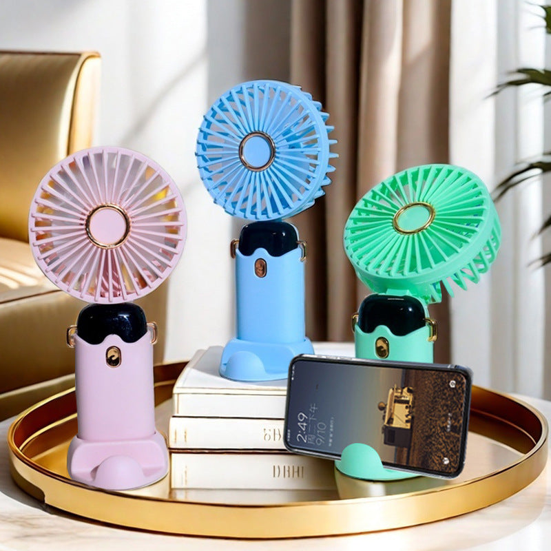 Ladies portable handheld fan with USB charging function and flexible tilt Stornfield
