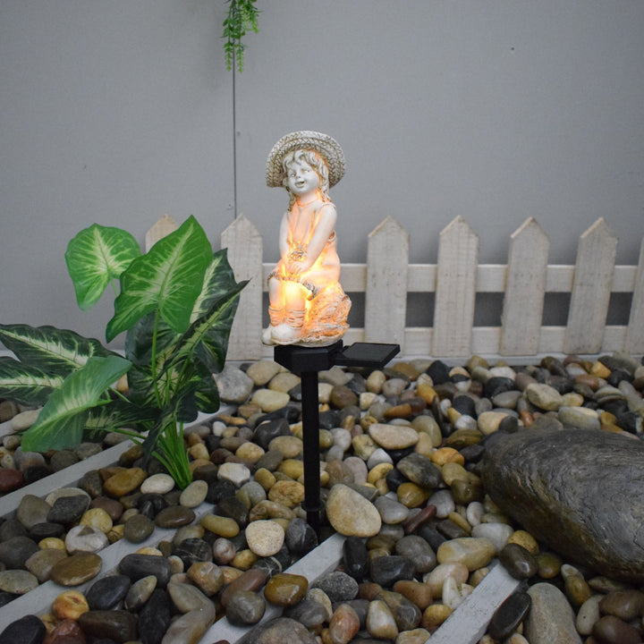Decorative Solar Garden Stake Statue Resin Girl Figurine With Integrated Solar LED And Weatherproof Spike Stornfield