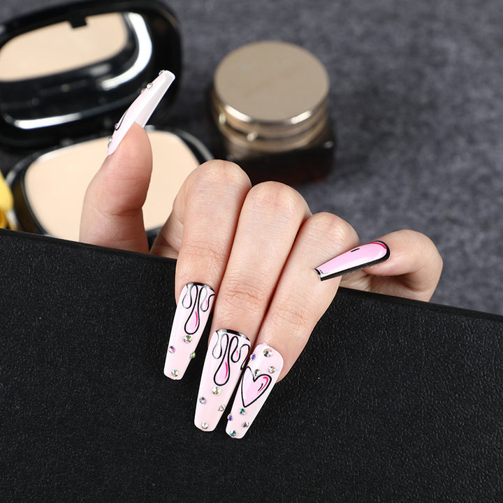 Eye-catching artificial nails with soulful heart design and glamorous accents Stornfield