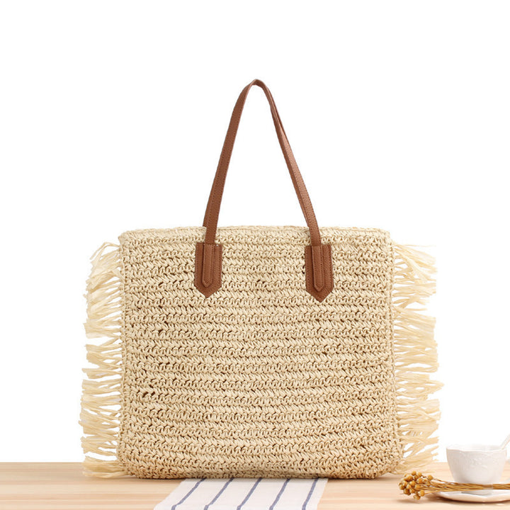 Beach bag with fringes and sturdy leather handles Stornfield