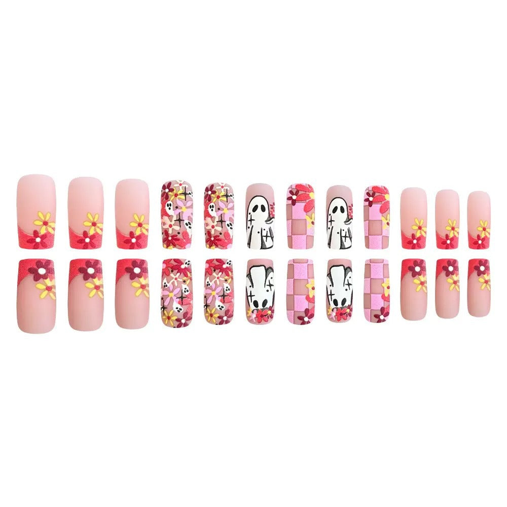 Artificial nail set with playful 3D designs and blooming patterns Stornfield