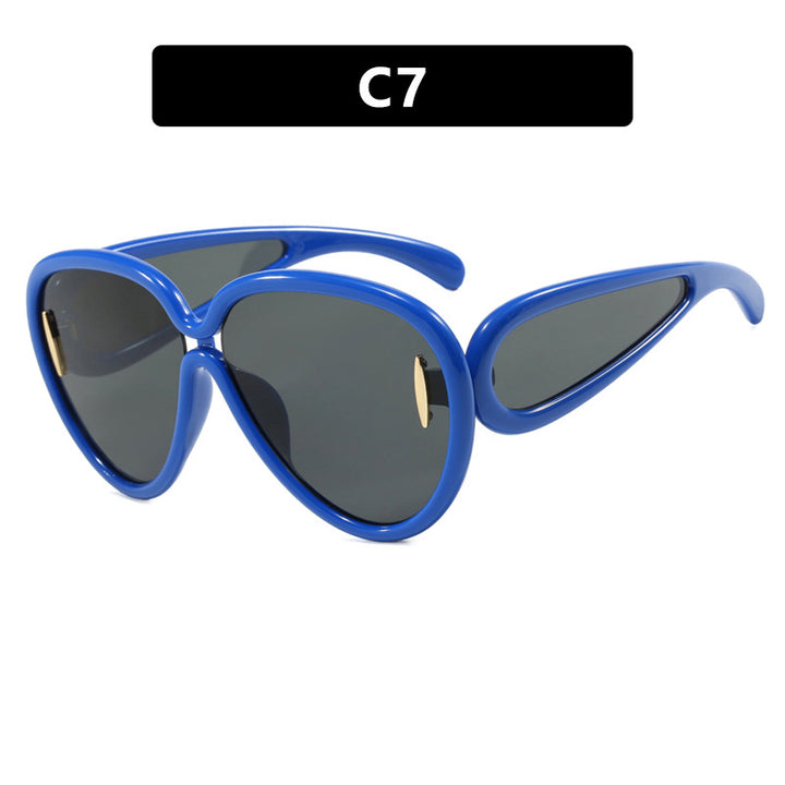 Women extravagant sunglasses in creative design Stornfield