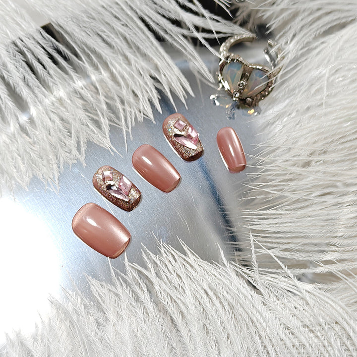 Artificial nails with glitter and crystal accents Stornfield