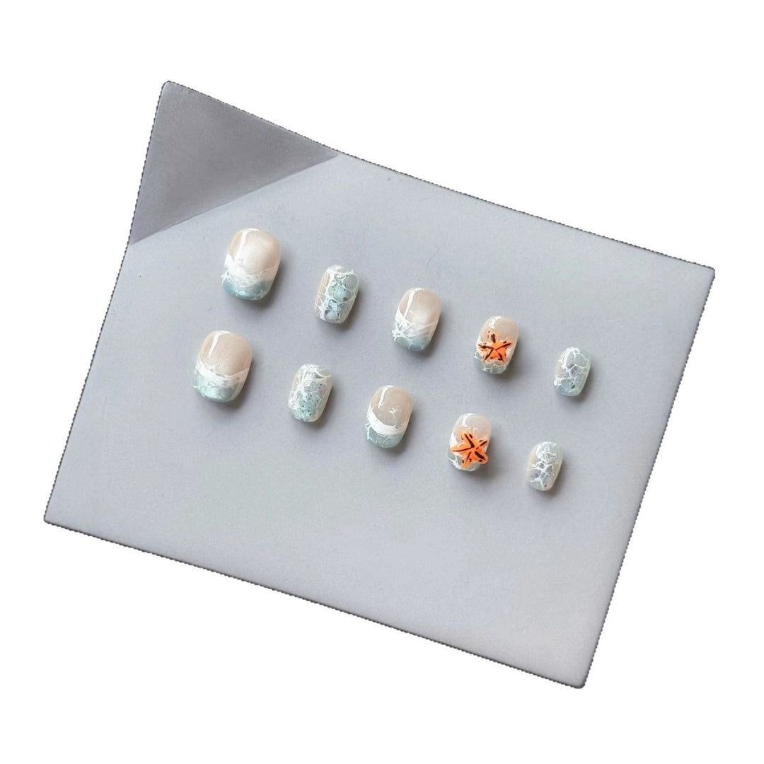Elegant Press-On Nail Art Set with Ocean-Inspired Design