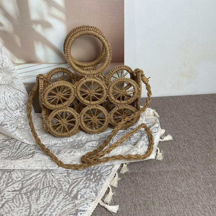 Artisan woven basket bag with striking wheel pattern Stornfield