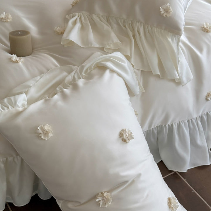 Luxurious satin bedding set with ruffles and 3D flowers
