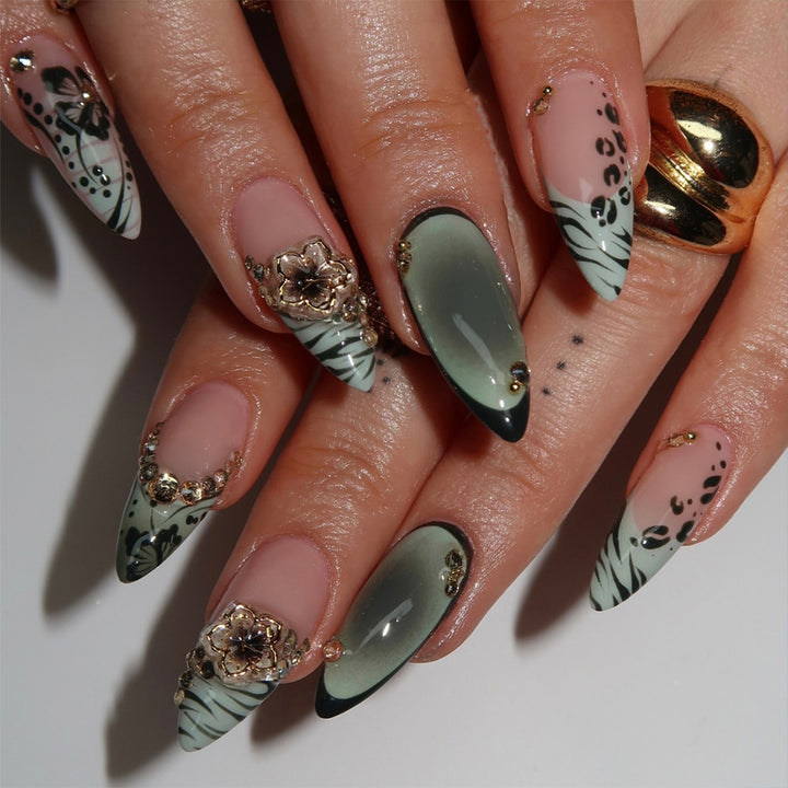 Artful Stiletto Fingernails with Floral and Geometric Decorations Stornfield