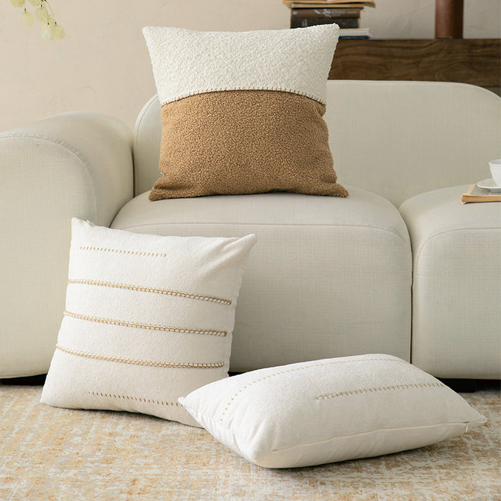 Decorative bouclé pillow with teddy fleece structure and decorative stitching Stornfield