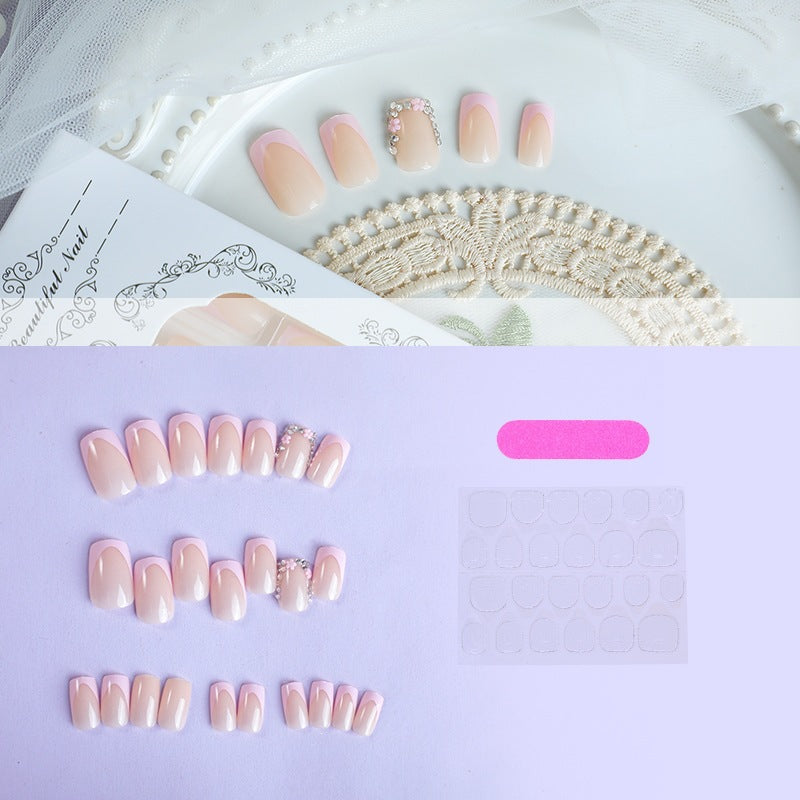 Artificial nails with romantic pink tips Stornfield