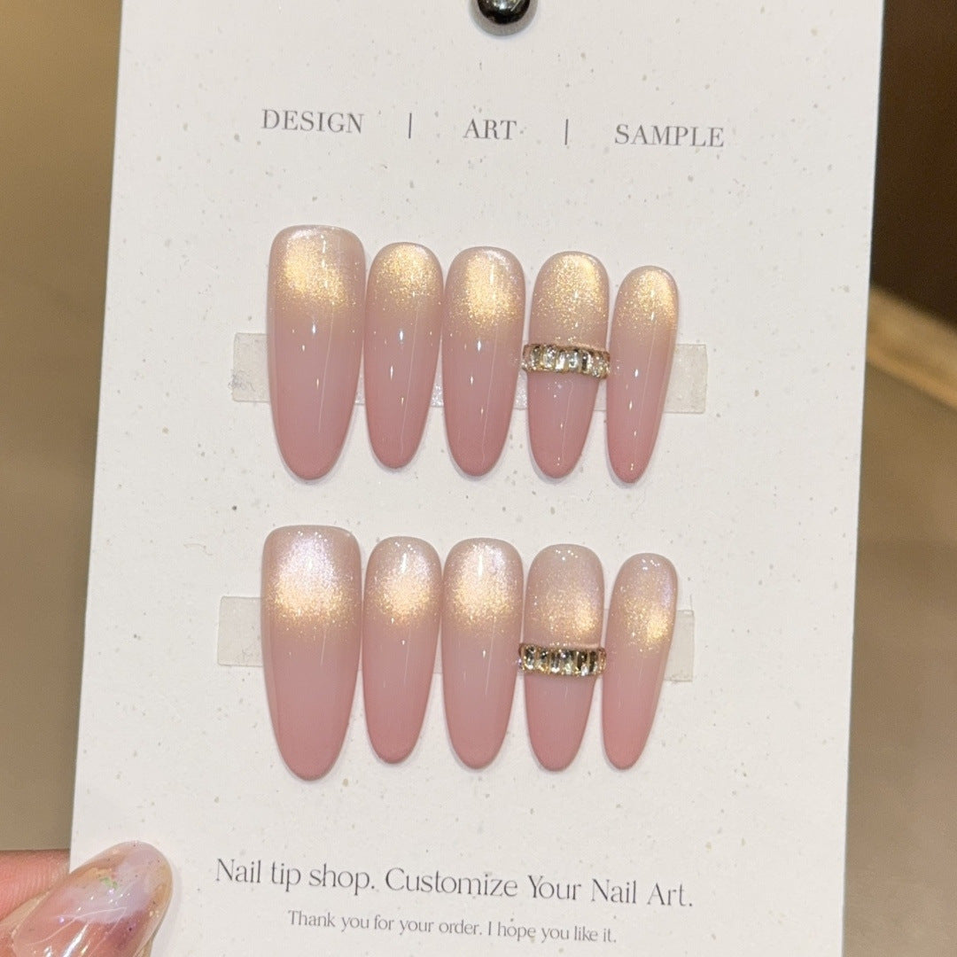 Glamorous artificial nails with elegant glitter and rhinestone application Stornfield