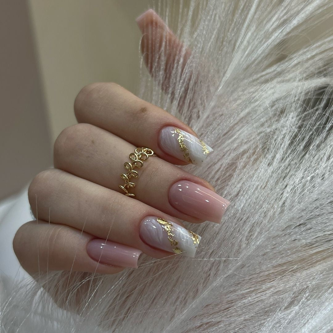 Artistic Nail Extensions with Elegant Gold Design Stornfield