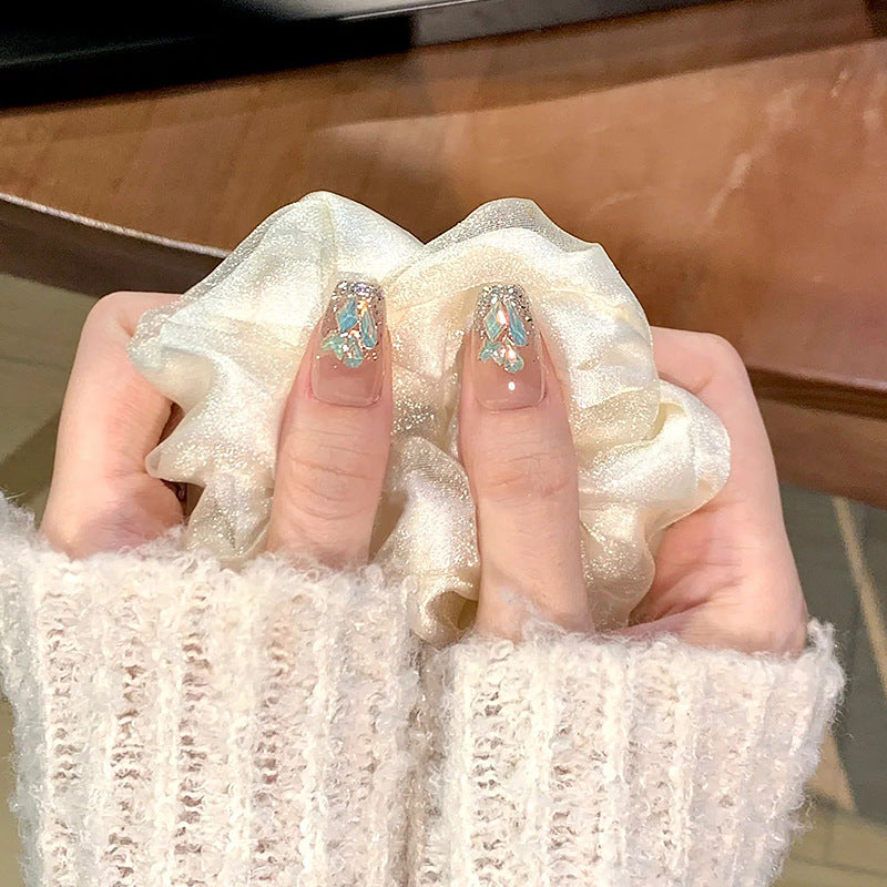 Glamorous artificial nail set with luxurious glitter elements Stornfield
