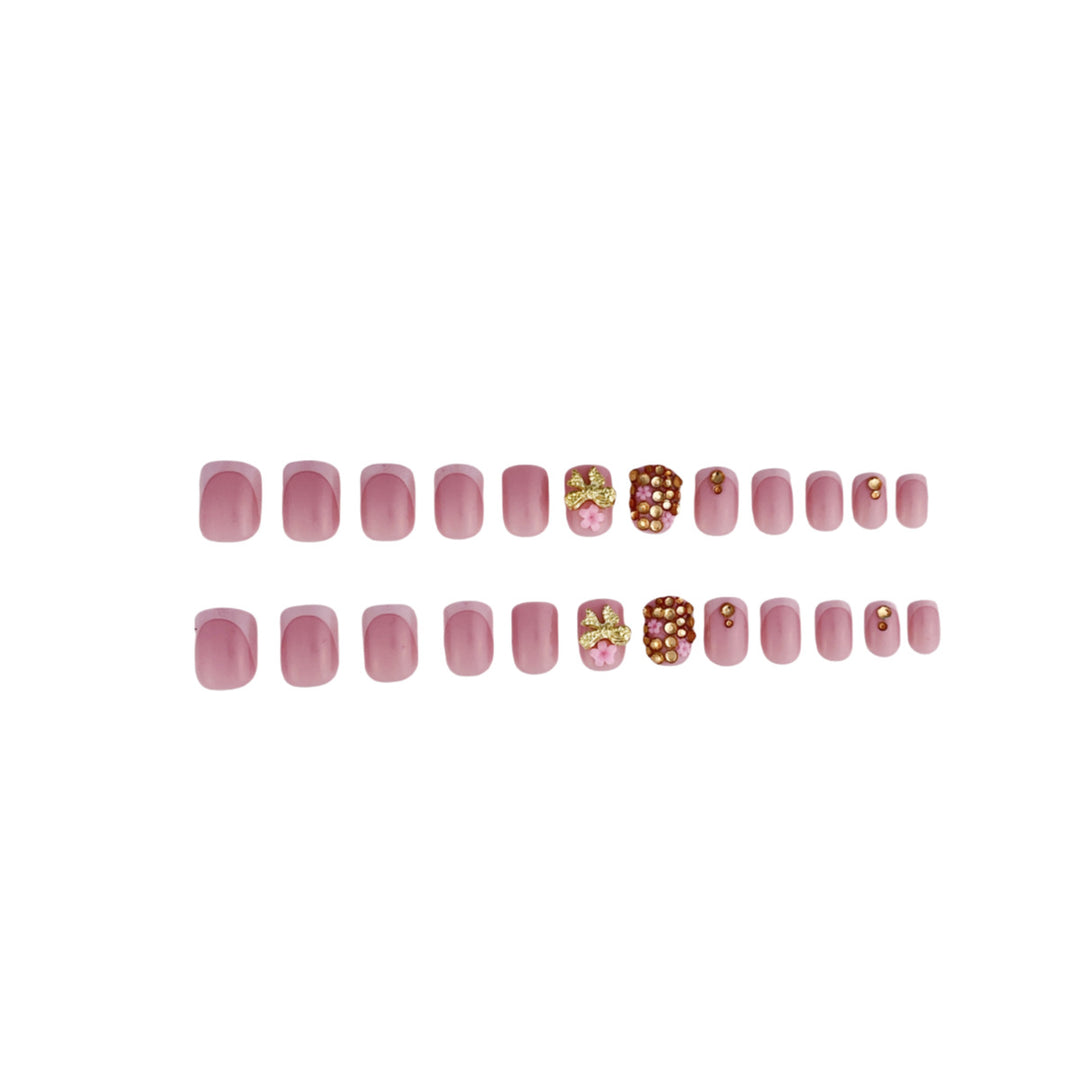 Glamorous Rhinestone and Floral Nail Art Stornfield