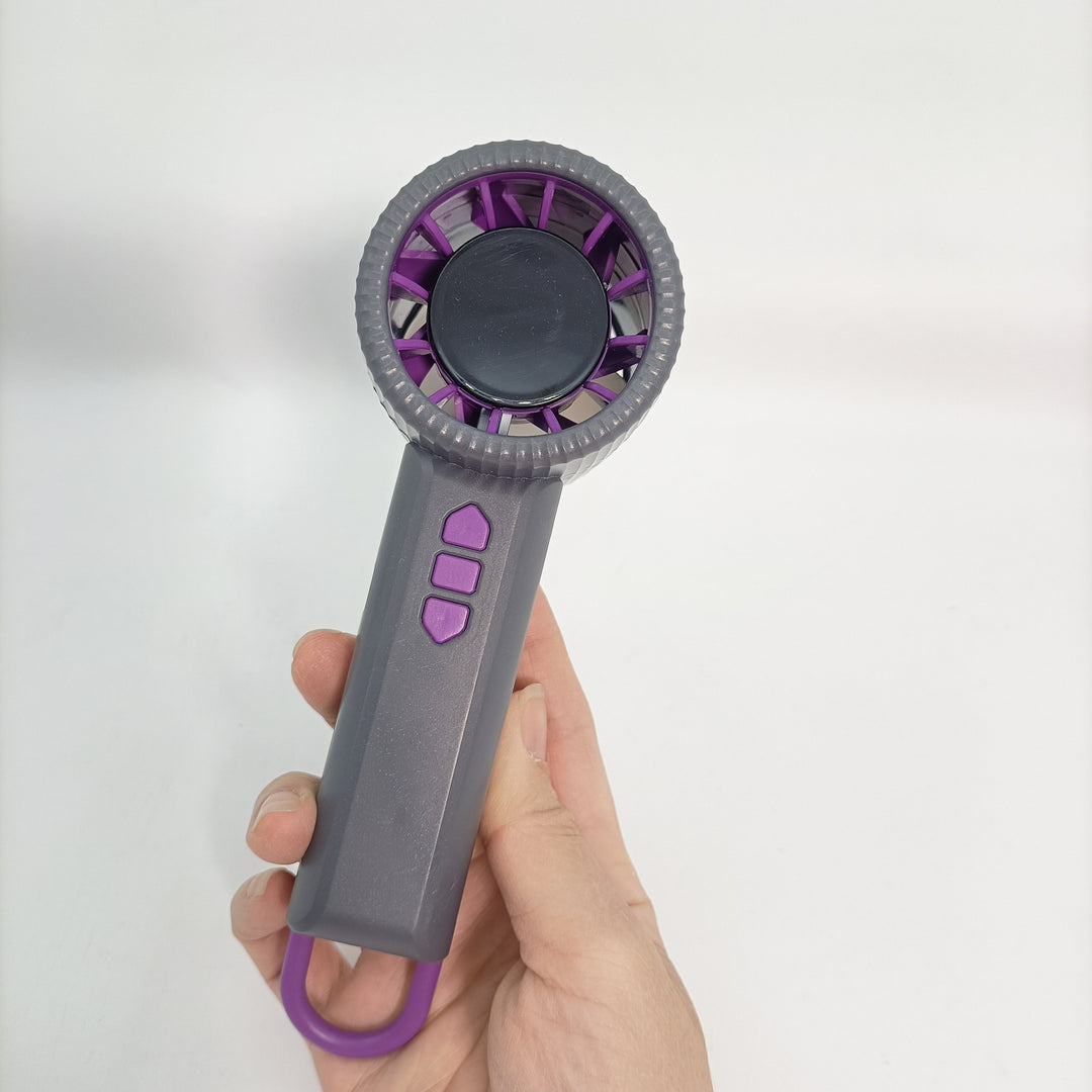 Unisex Portable Hand Fan with multiple speed settings and ergonomic design Stornfield