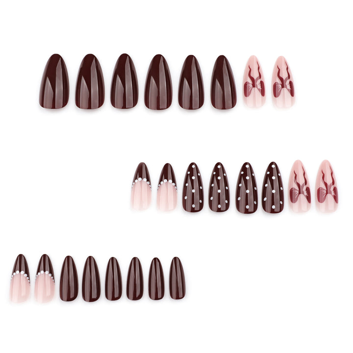 Elegantly designed stiletto nails with artistic accents Stornfield