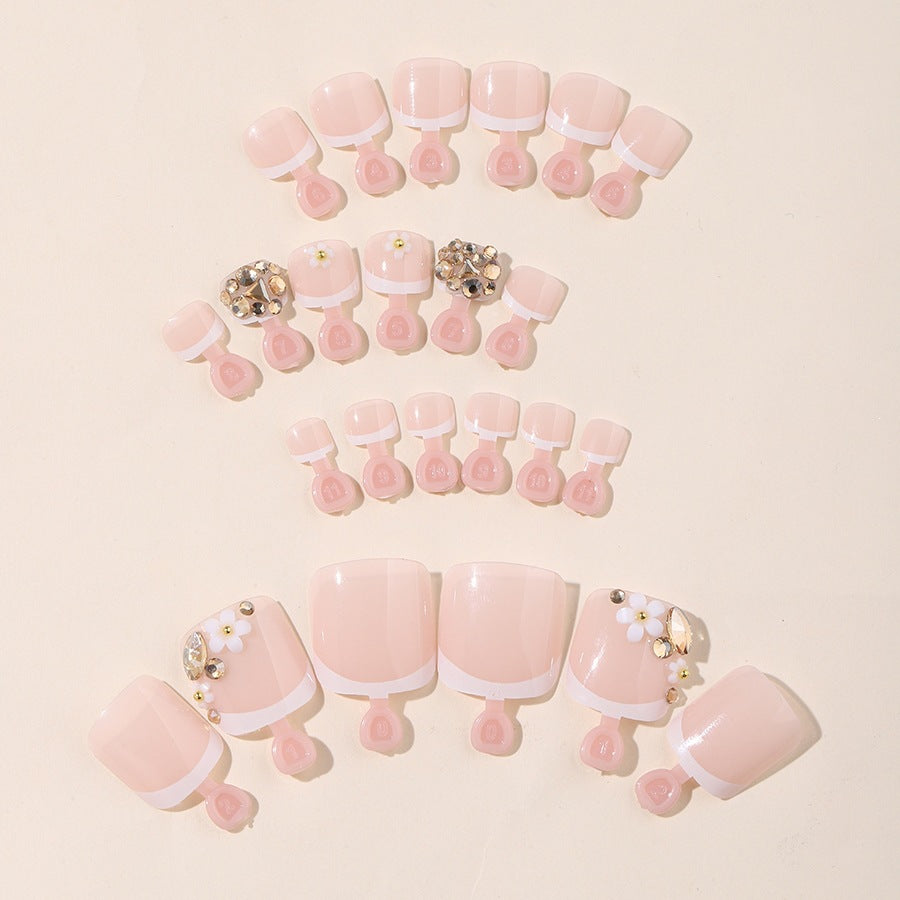 Acrylic nail set with elegant glitter and flower details Stornfield
