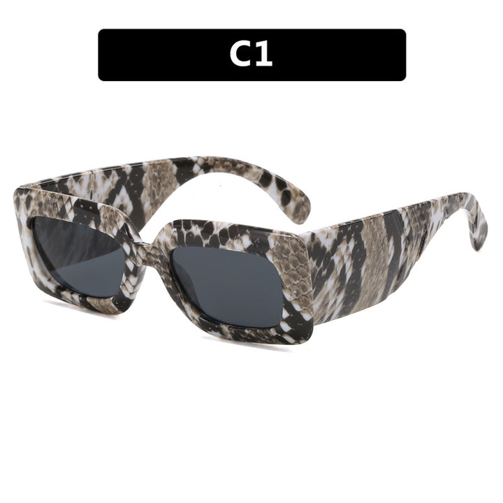 Women extravagant sunglasses with striking snake pattern Stornfield