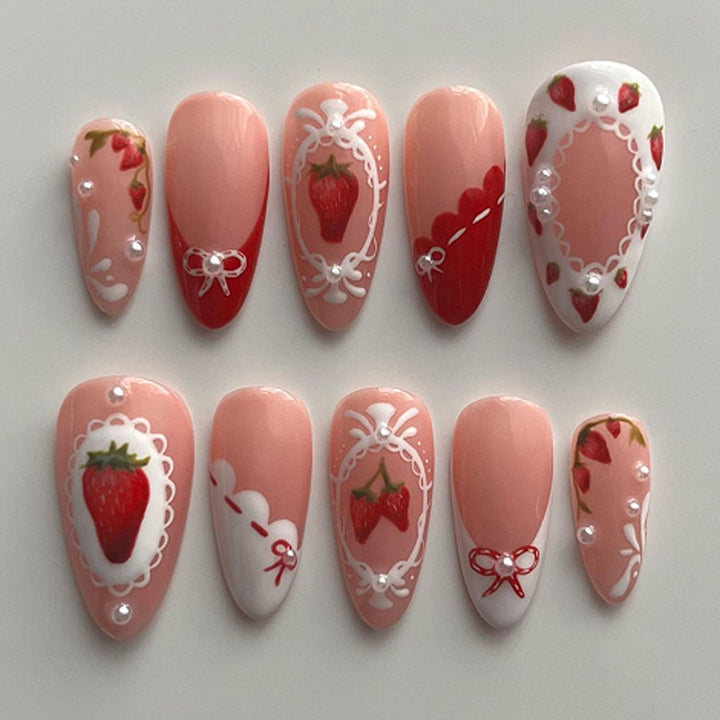Artful nail extensions with strawberry motifs Stornfield