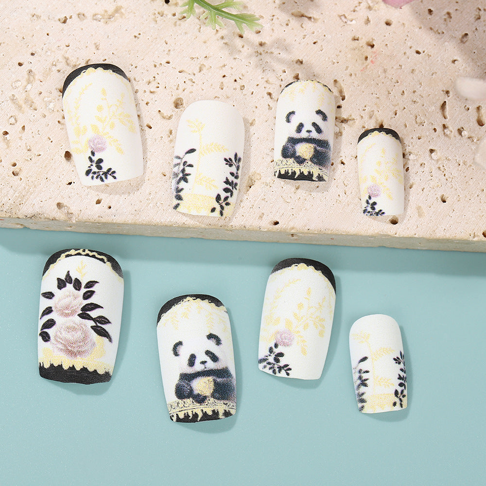 Artificial nails with floral panda design Stornfield