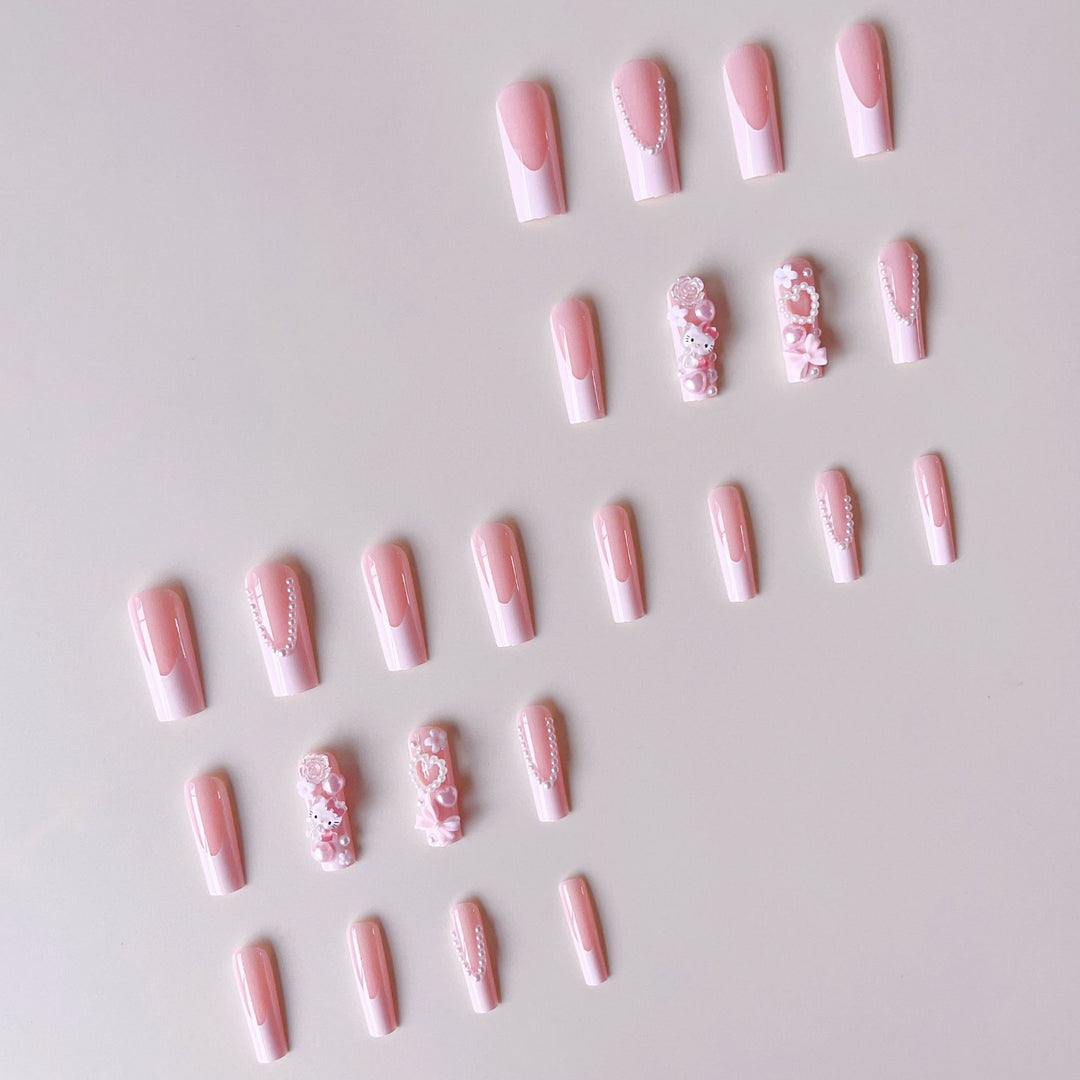 Acrylic nail set with playful 3D accents and pearl details Stornfield